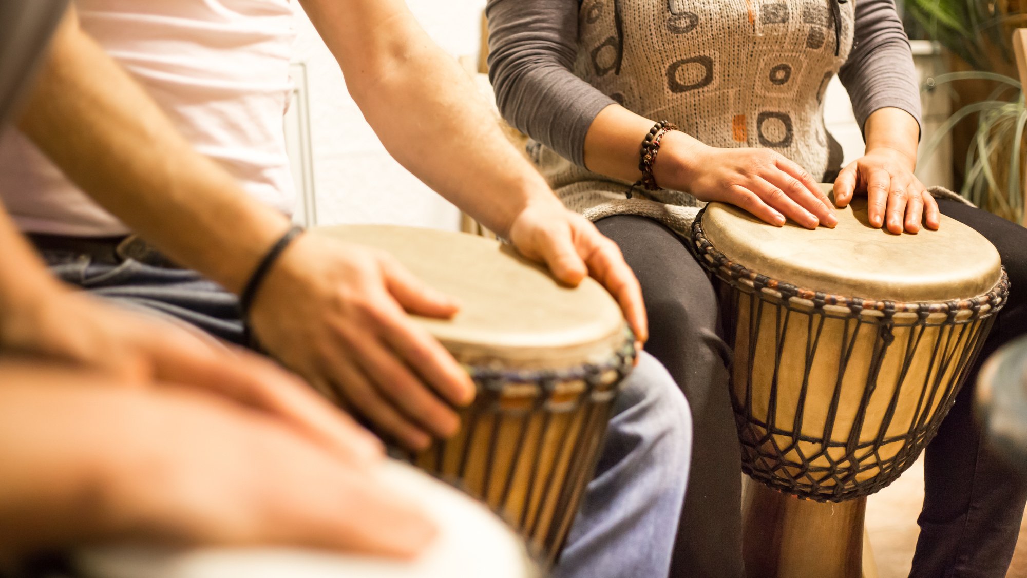 Close up of Hands on African Drums, Drumming for a Music